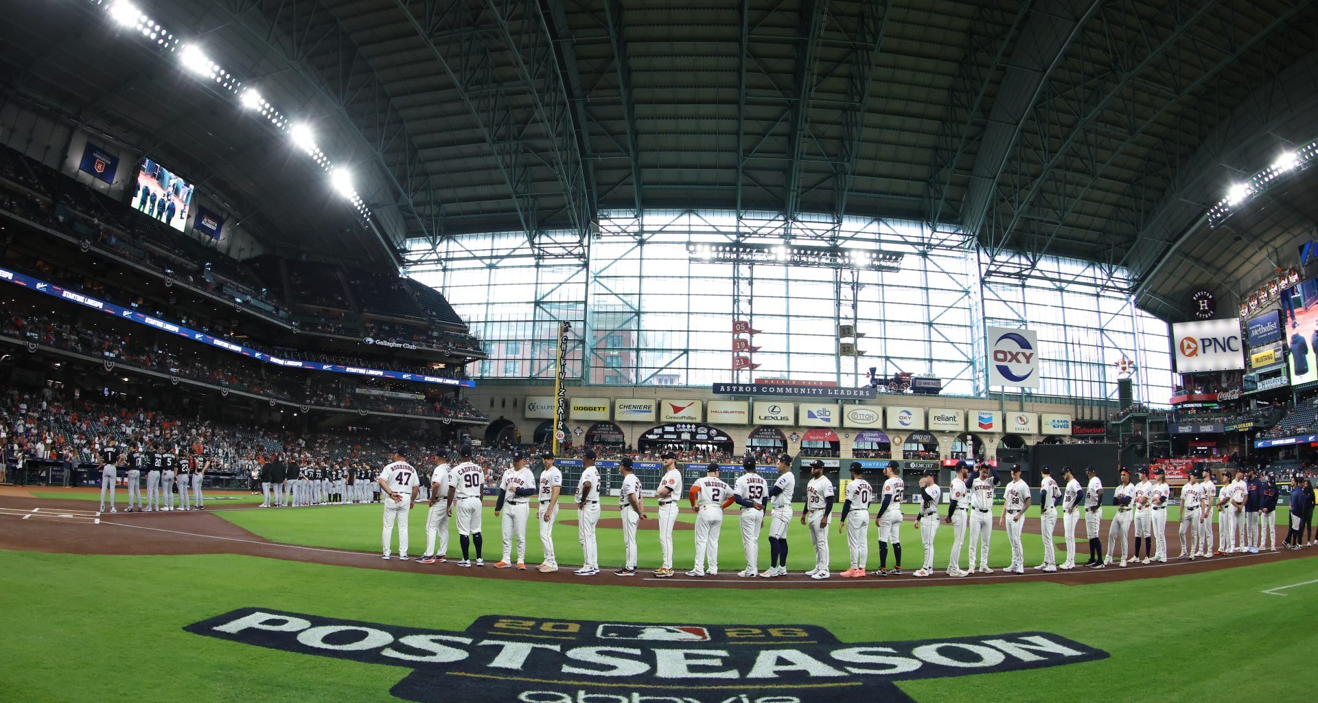 Sep 29, 2026; Houston, Texas, USA; The Houston Astros line up for the beginning of the game against the Chicago White Sox during game one of the Wildcard round for the 2026 MLB Playoffs at Daikin Park.