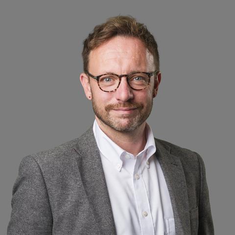 Adam McPartland headshot