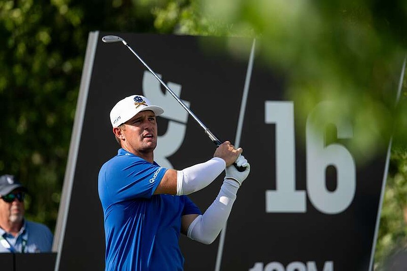 Captain Bryson DeChambeau, of Crushers GC, hits from the 16th tee during the first round of LIV Golf Bedminster at Trump National Golf Club, Thursday, Aug. 6, 2026, in Bedminster, N.J. (Montana Pritchard/LIV Golf via AP)
