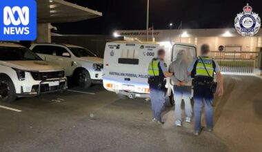 Melbourne man charged with possessing violent extremist material after airport arrest