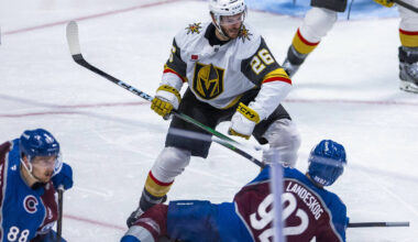 Golden Knights center Nic Dowd (26) looks to Colorado Avalanche left wing Gabriel Landeskog (92 ...