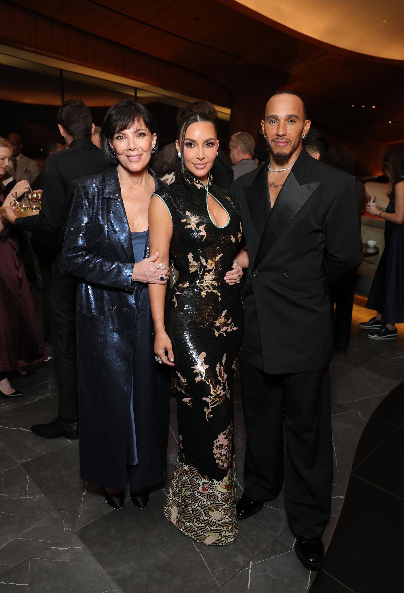 LOS ANGELES CALIFORNIA SEPTEMBER 19 Kim Kardashian Kris Jenner and Lewis Hamilton attend the Lucas Museum of Narrative...