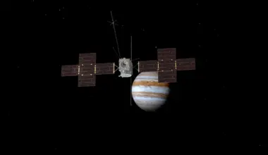Spacecraft zips by Earth on long journey to Jupiter’s icy moons