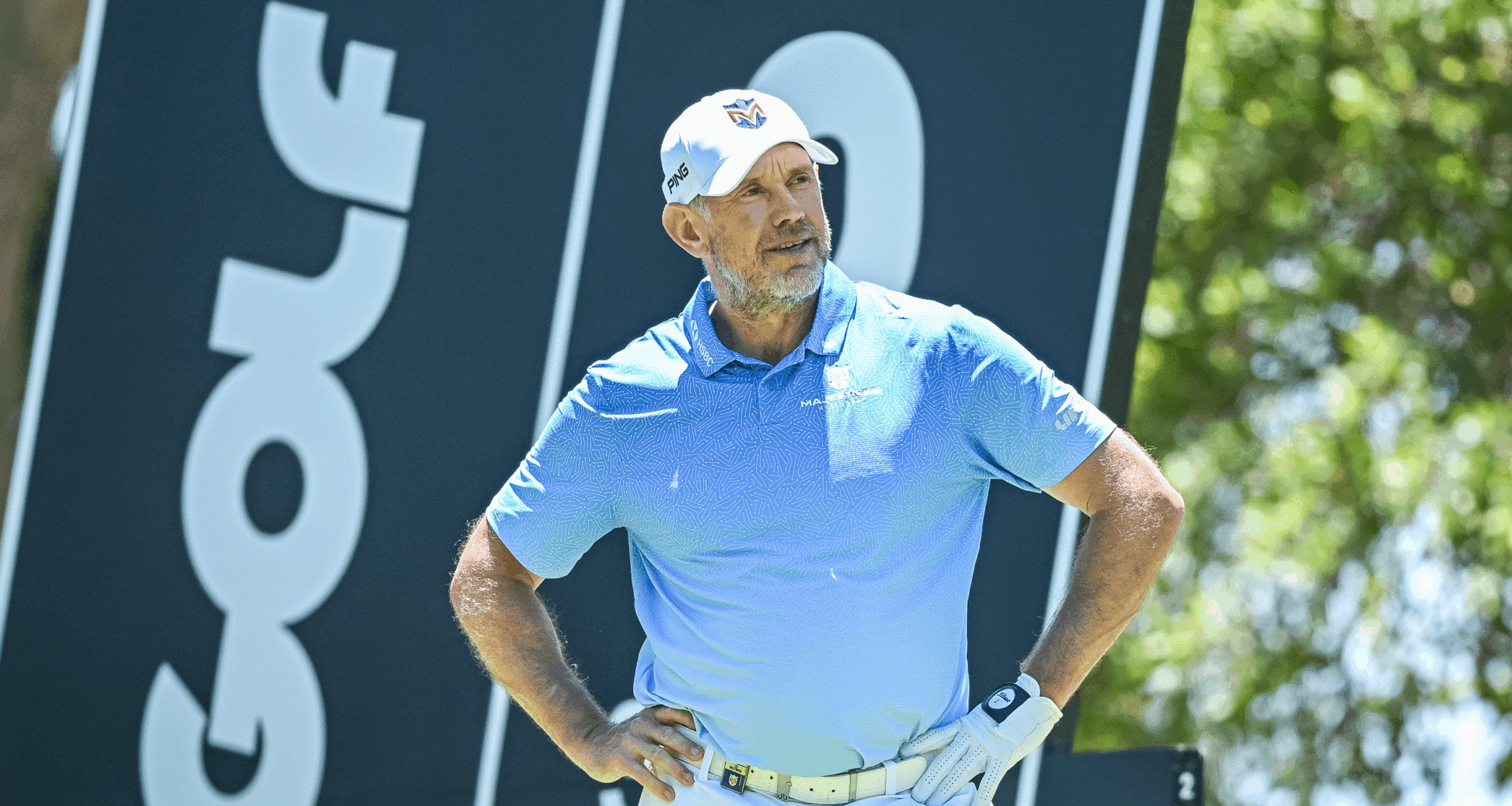 Lee Westwood stands with his hands on his hips during a LIV Golf event in 2026