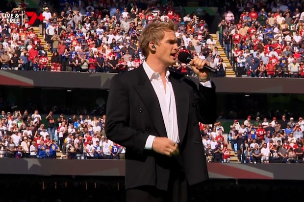 Cody Simpson performs at the Melbourne NFL match.