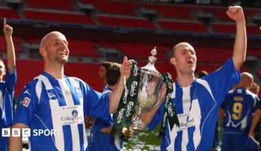 Whitley Bay strikers Paul Chow (left) and Lee Kerr celebrate with the FA Vase trophy