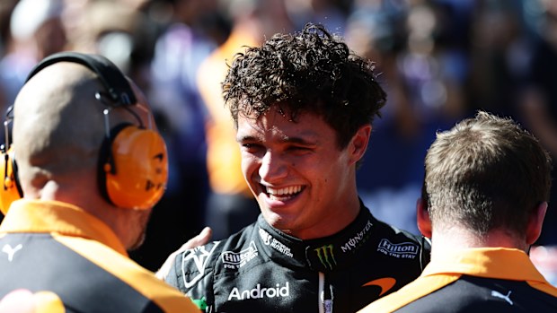 Norris celebrates getting pole position.