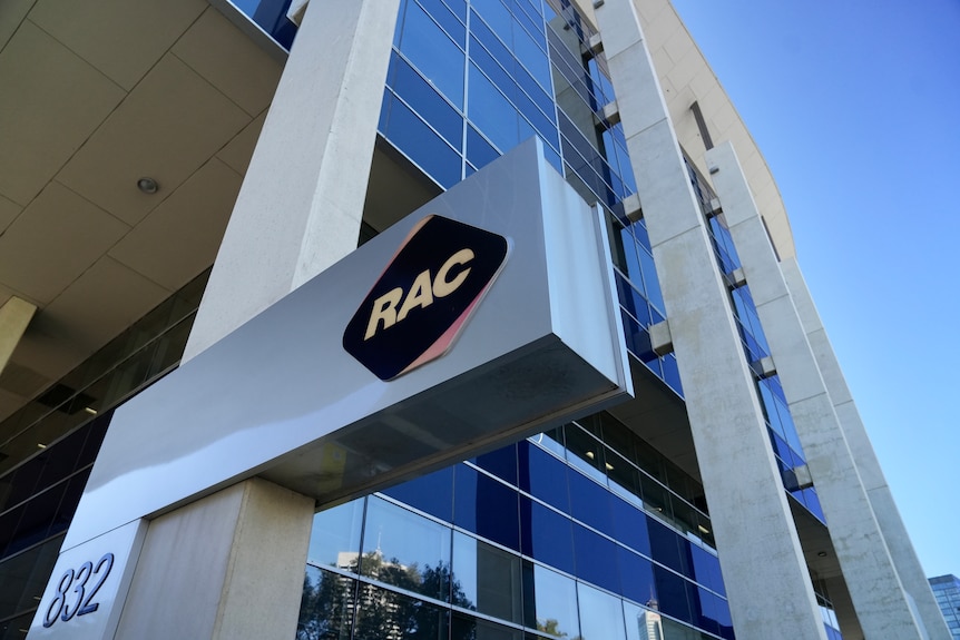 A close-up of the RAC logo on a building.