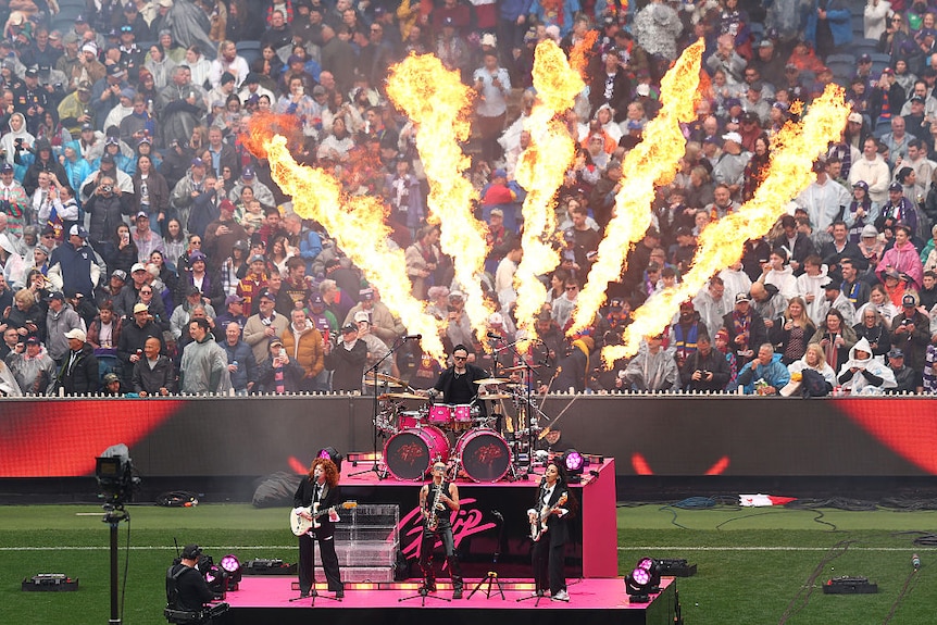 G Flip and musicians on stage at MCG