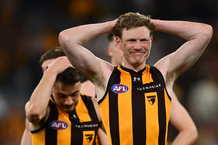 James Sicily of the Hawks looks dejected after the AFL preliminary final loss to the Lions.