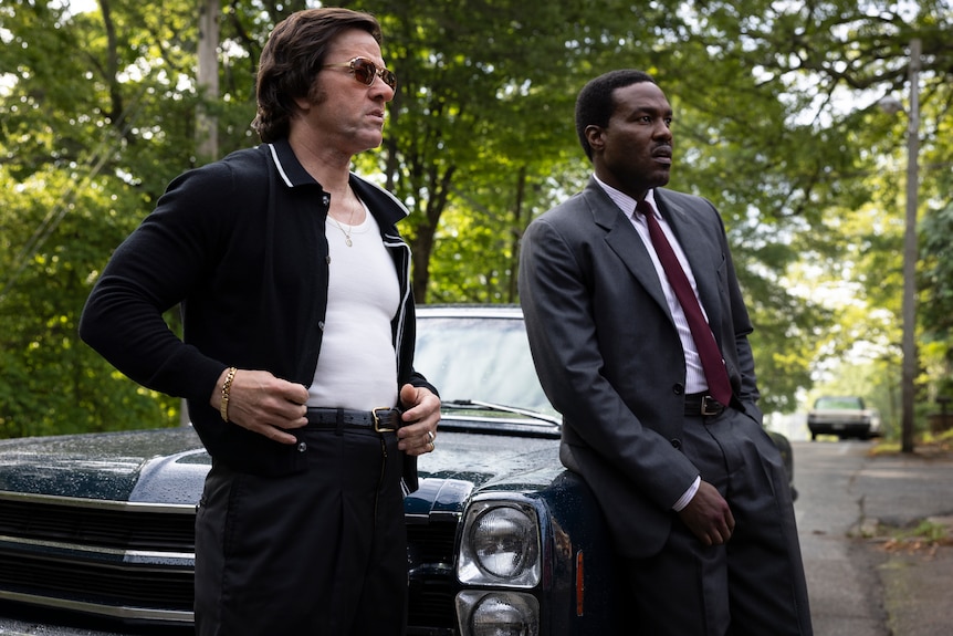Yahya Abdul-Mateen II and Mark Wahlberg in By Any Means.