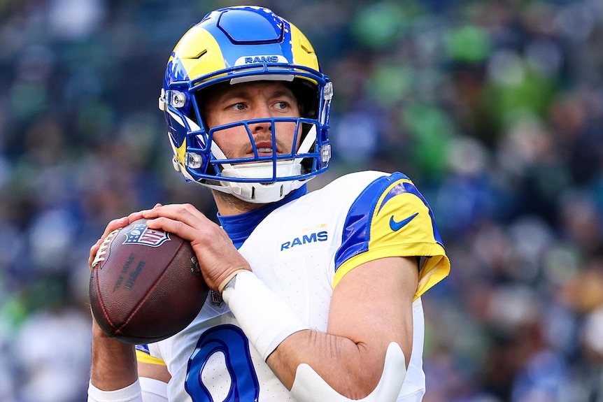 Matthew Stafford prepares to throw a ball