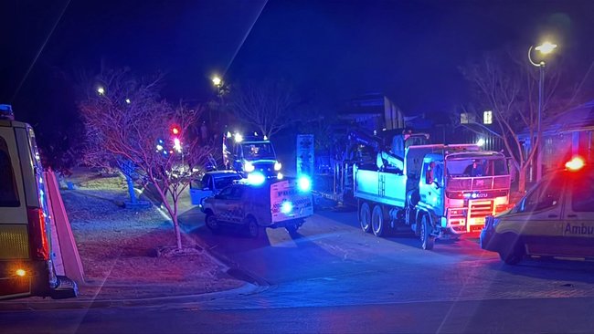 Emergency crews respond on a Fernvale street following the fatal incident.