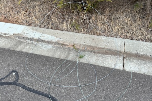 Wire along a bike path.