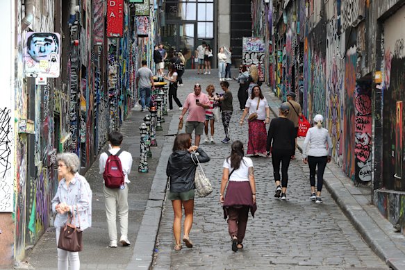Tourists flock to Hosier Lane, one of Melbourne CBD’s favourite laneways.