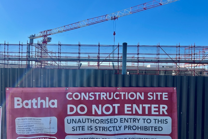A sign at a Bathla construction site says not to enter.