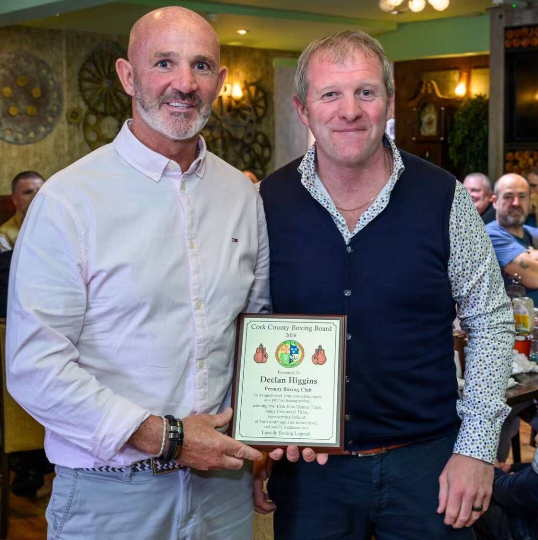 Multiple Irish Boxing champion Declan Higgins is presented with his Recognition Plaque by Tom Murray 