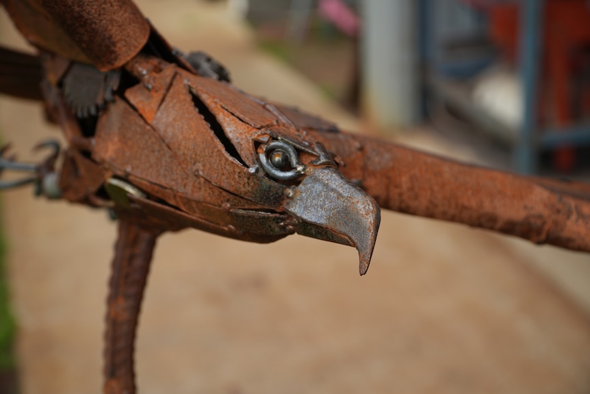 An eagle made out of brown metal 