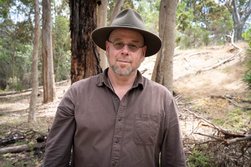 Man standing in dry Australian bush