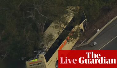 Australia news live: Man dead and multiple people injured after bus collides with two cars in Victoria; workers on 13 Bathla sites stood down as funding runs out | Australia news