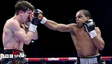 Gerome Warburton lands a punch on Nathan Heaney