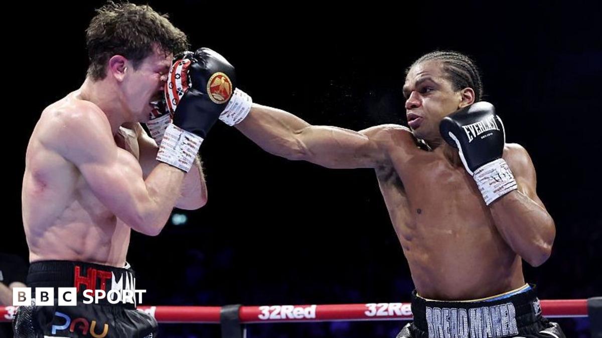Gerome Warburton lands a punch on Nathan Heaney