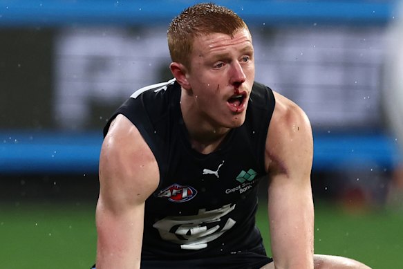 Blues defender Harry Dean after taking a shin to the face.