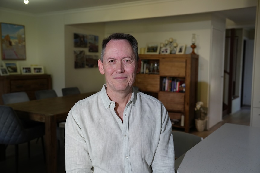 a man in a white shirt