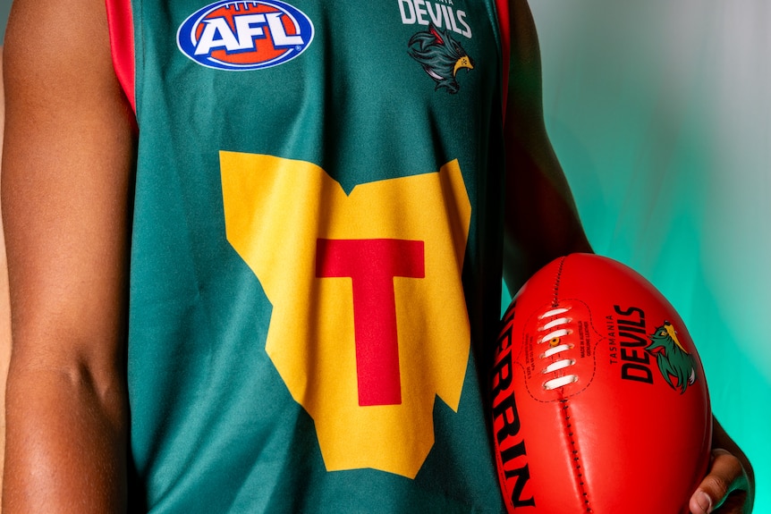 Close-up of Tasmania Devils AFL team foundation jumper design.
