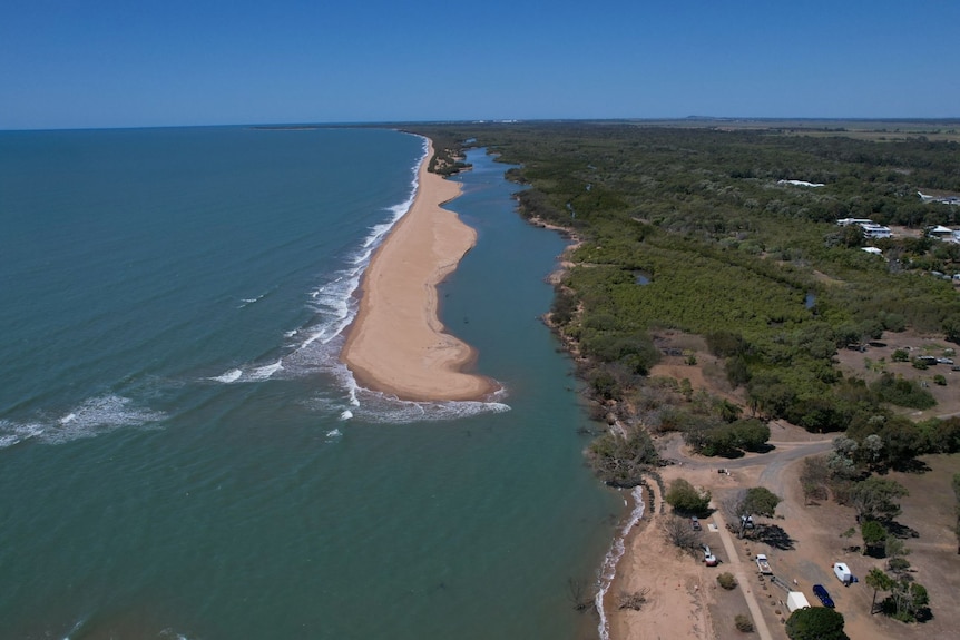 aerial image of Moore Park Creek mouth, a sand bar and the ocean.