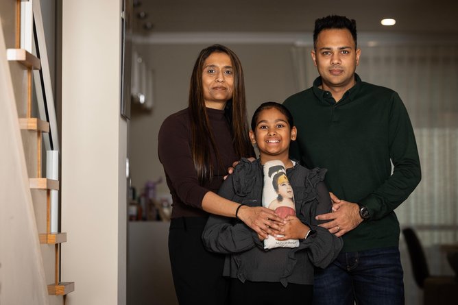 Preeti and Janesh Raghwani with daughter Mahi, who keeps a doll to remember her sister. 