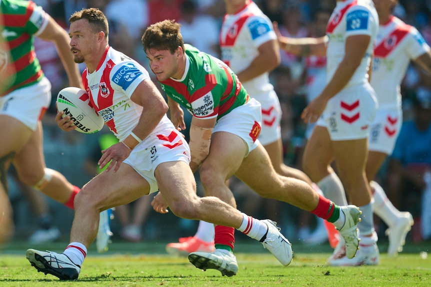 Damien Cook runs the ball