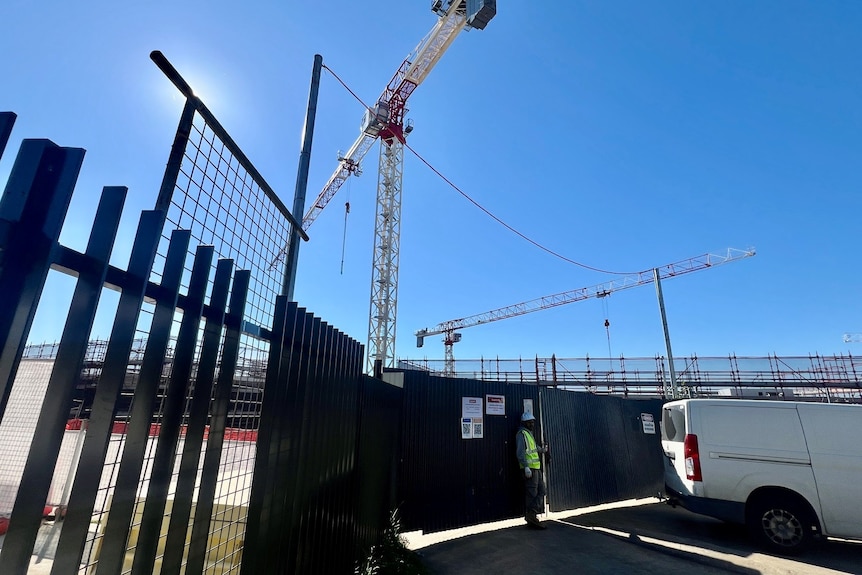 A Bathla construction site with a crane in the background. 
