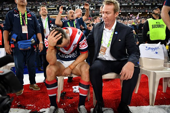 Cooper Cronk with Roosters coach Trent Robinson after winning the 2018 grand final.