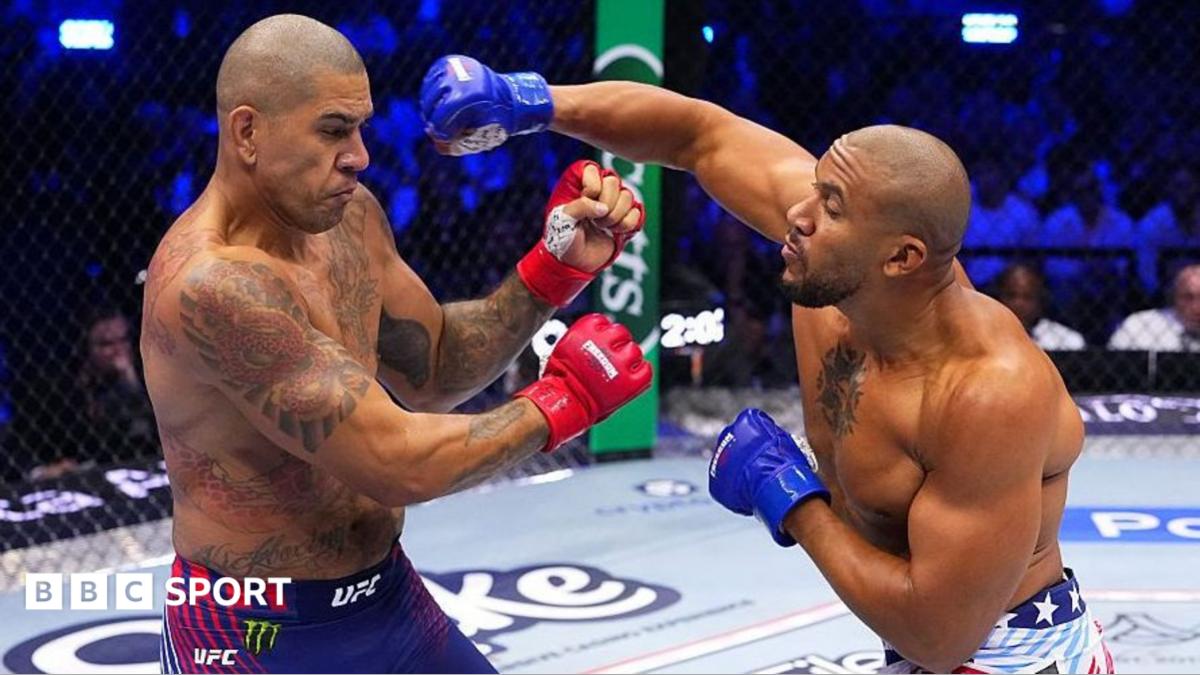Alex Pereira is punched by Ciryl Gane in their UFC fight
