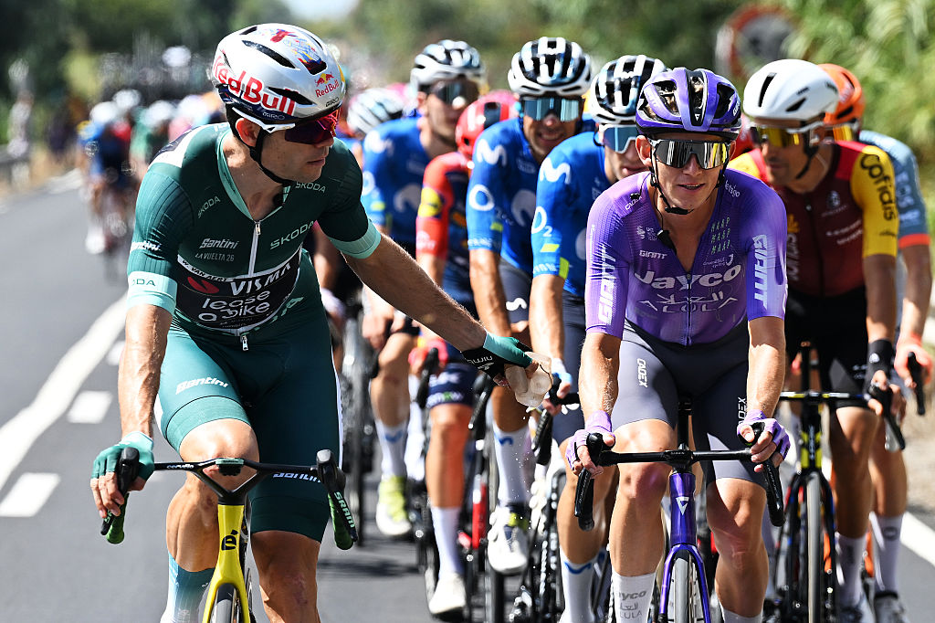 SEVILLA, SPAIN - SEPTEMBER 09: (L-R) Wout Van Aert of Belgium and Team Visma | Lease a Bike - Green Points Jersey and Koen Bouwman of Netherlands and Team Jayco AlUla compete during the La Vuelta - 81st Tour of Spain 202, Stage 17 a 185km stage from Dos Hermanas to Sevilla / #UCIWT / stage from on September 09, 2026 in Sevilla, Spain. (Photo by Tim de Waele/Getty Images)