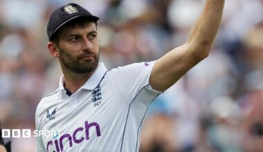 Mark Wood waves to the crowd after leaving the field during a Test match