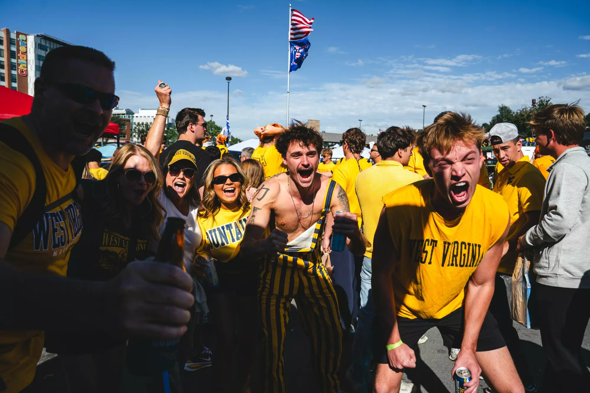 Fans tailgate before West Virginia's game against Oklahoma State on Sept. 26, 2026, in Morgantown, W.Va.