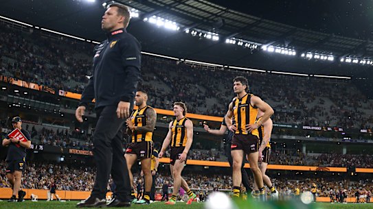 Sam Mitchell and his Hawks leave the field.