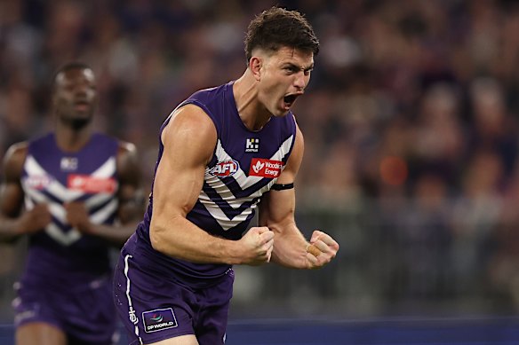 The “Prancing Pony” in full flight: Patrick Voss of the Dockers celebrates a goal.