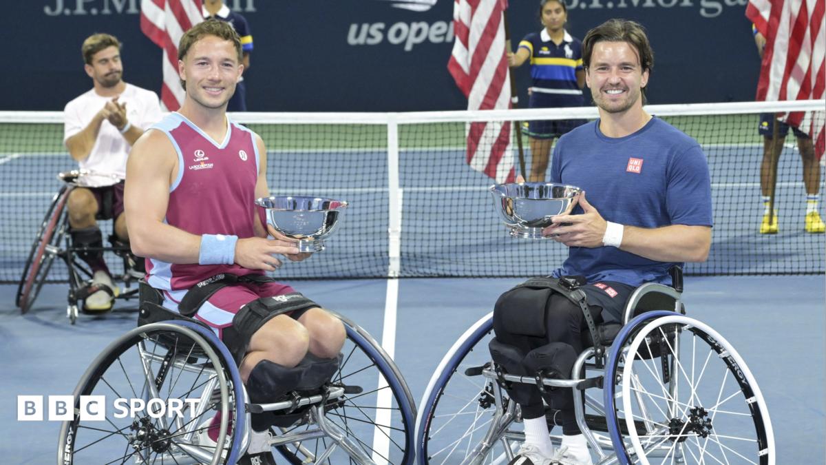 Alfie Hewett and Gordon Reid hold the US Open men's wheelchair doubles trophies