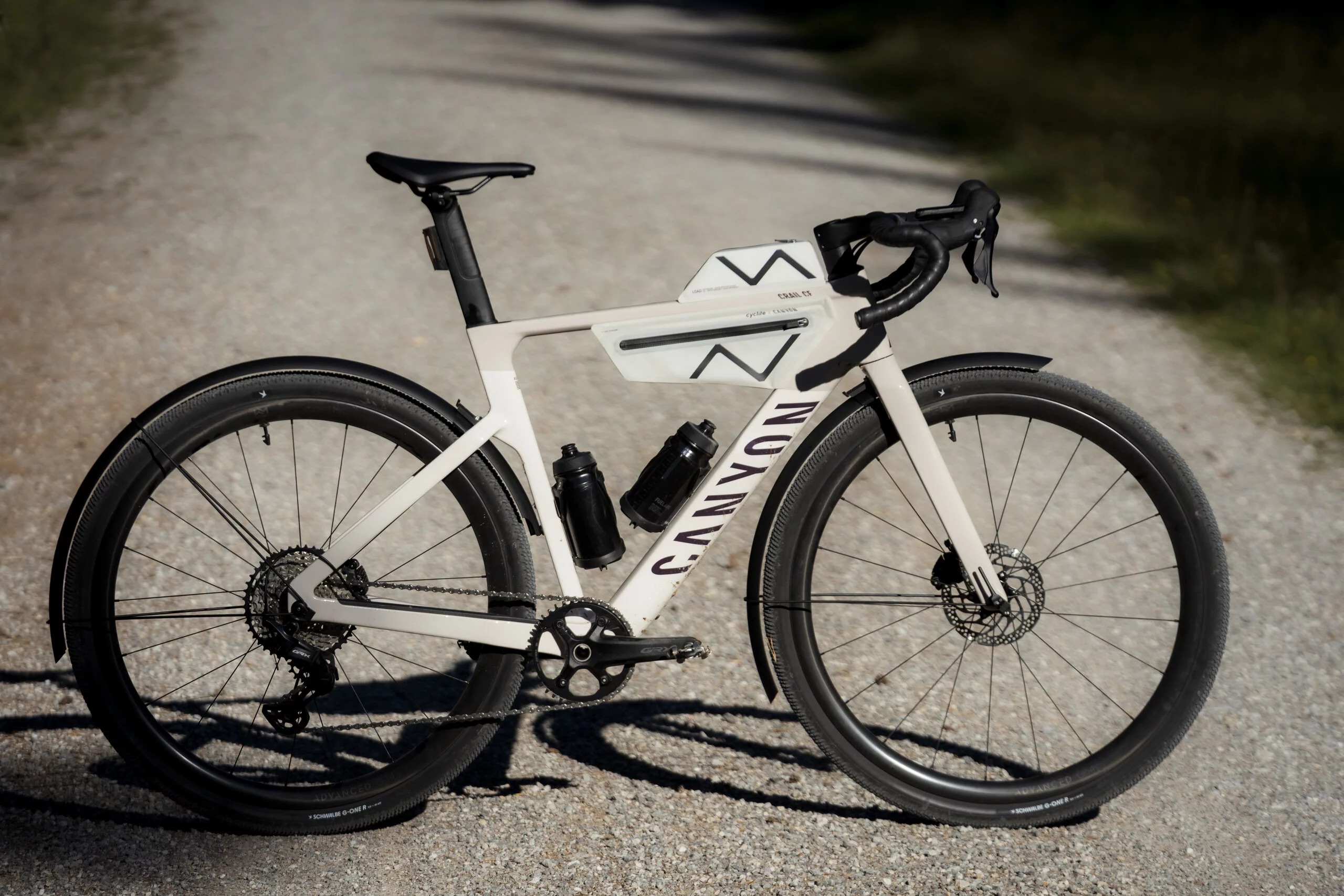 A Canyon Grail CF fitted with Cyclite bags and fast fenders