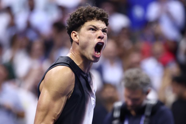 USA's Ben Shelton celebrates his win against Spain's Carlos Alcaraz during the men's singles quarter-final tennis match on day ten of the US Open tennis tournament at the USTA Billie Jean King National Tennis Center in New York City on September 9, 2026. (Photo by Leonardo MUNOZ / AFP) / The erroneous mention[s] appearing in the metadata of this photo by Leonardo MUNOZ has been modified in AFP systems in the following manner: [USA's Ben Shelton] instead of [Spain's Carlos Alcaraz]. Please immediately remove the erroneous mention[s] from all your online services and delete it (them) from your servers. If you have been authorized by AFP to distribute it (them) to third parties, please ensure that the same actions are carried out by them. Failure to promptly comply with these instructions will entail liability on your part for any continued or post notification usage. Therefore we thank you very much for all your attention and prompt action. We are sorry for the inconvenience this notification may cause and remain at your disposal for any further information you may require.