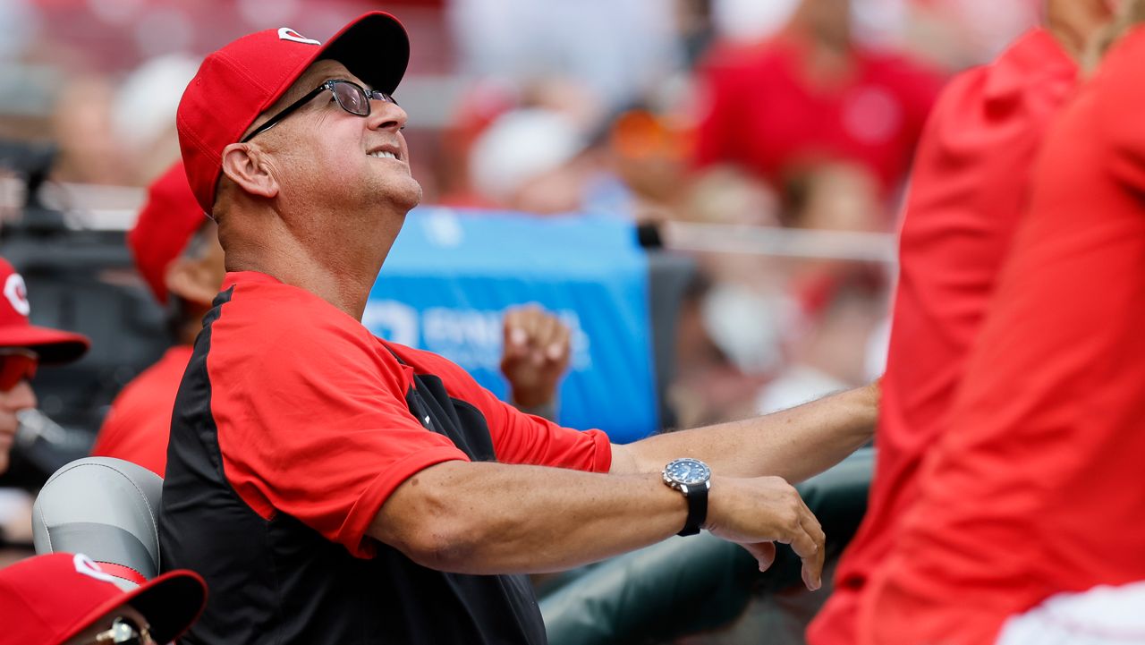 Cincinnati Reds manager Terry Francona watches a fly ball against the Colorado Rockies during the third inning of a baseball game, Sunday, July 13, 2025, in Cincinnati. (AP Photo/Jay LaPrete)