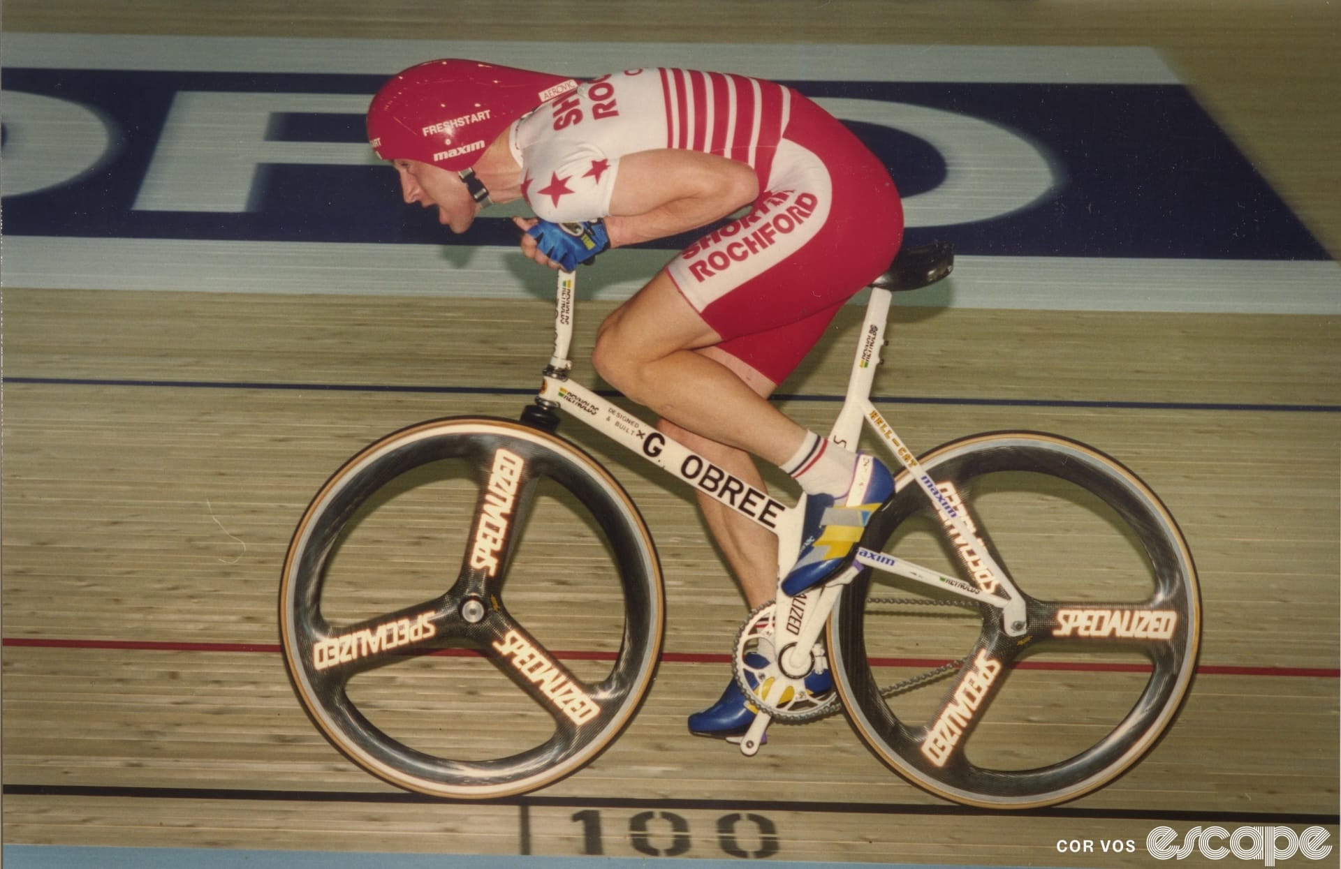 Graeme Obree rides his famous Praying Mantis position on the velodrome during a World Hour Record attempt.