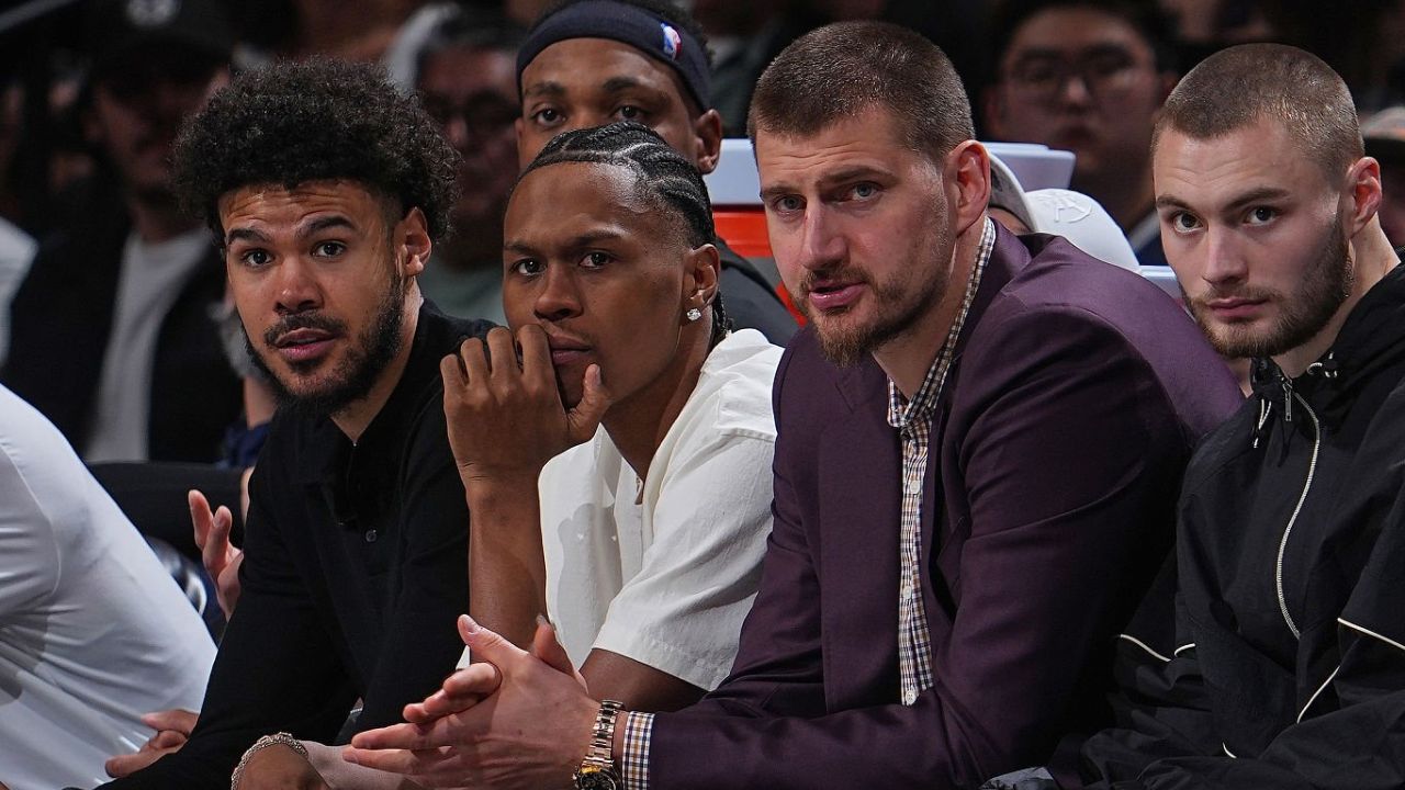Oklahoma City Thunder v Denver Nuggets DENVER, CO - APRIL 10: Cameron Johnson #23, Bruce Brown #11, Peyton Watson #8, Nikola Jokic #15 and Christian Braun #0 of the Denver Nuggets look on during the game against the Oklahoma City Thunder on April 10, 2026 at Ball Arena in Denver, Colorado. (Photo by Bart Young/NBAE via Getty Images)