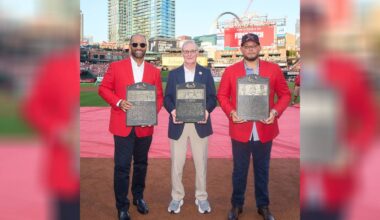 Former Cardinals first baseman Albert Pujols (left) and former Cardinals Catcher Yadier Molina (right) were inducted into the St. Louis Cardinals Hall of Fame Saturday at Busch Stadium. John Sherdel (center) spoke on behalf of his late grandfather, pitcher Bill Sherdel, who was also put into the team's Hall. (Courtesy: St. Louis Cardinals)