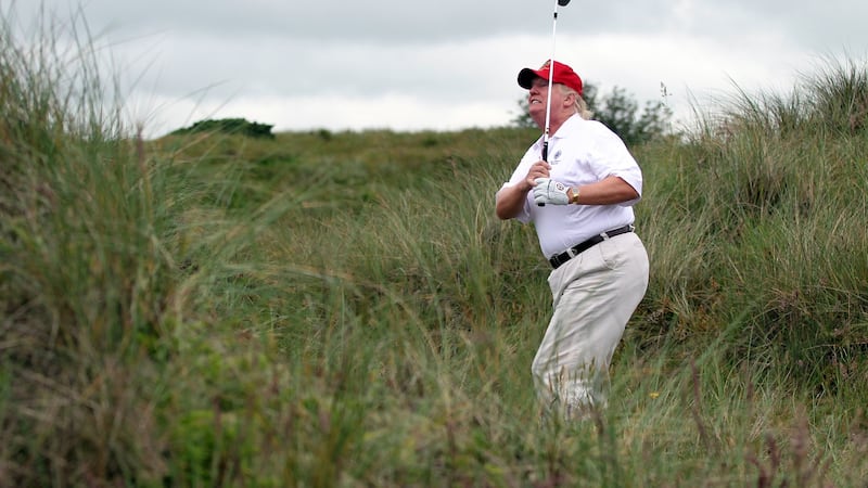 Donald Trump plays a round of golf after the opening of The Trump International golf links course in Aberdeen, Scotland, in July, 2012. Photograph: Ian MacNicol/Getty