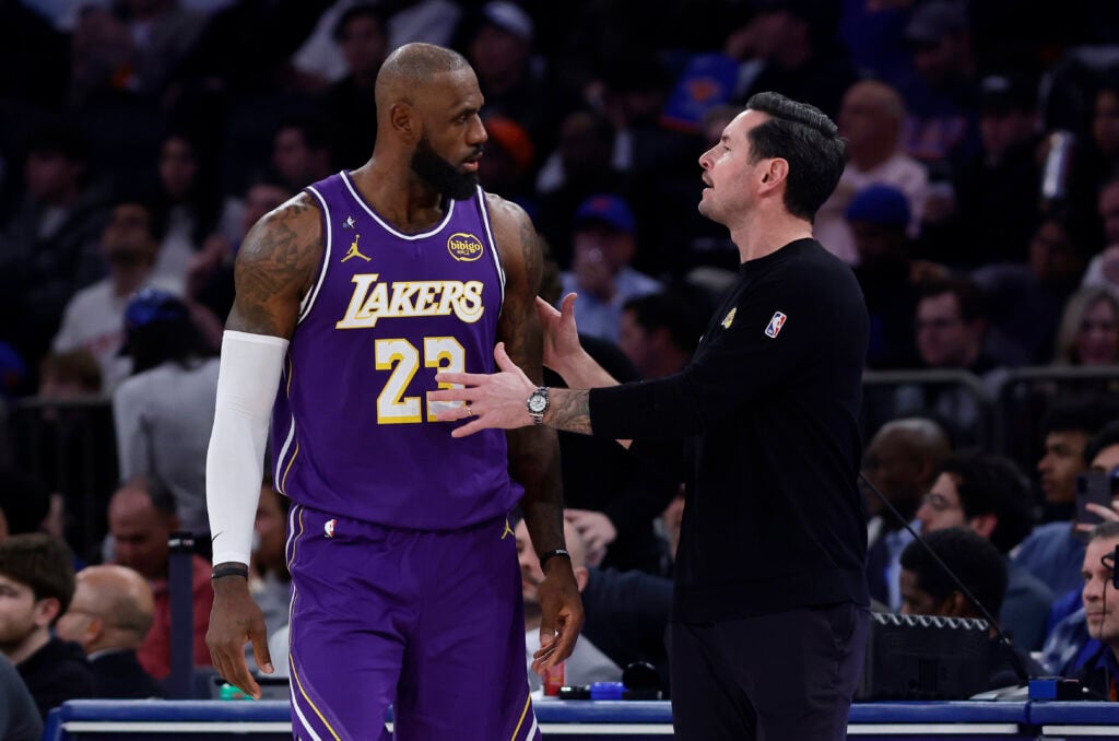 Head coach JJ Redick and LeBron James #23 of the Los Angeles Lakers in action against the New York Knicks at Madison Square Garden.