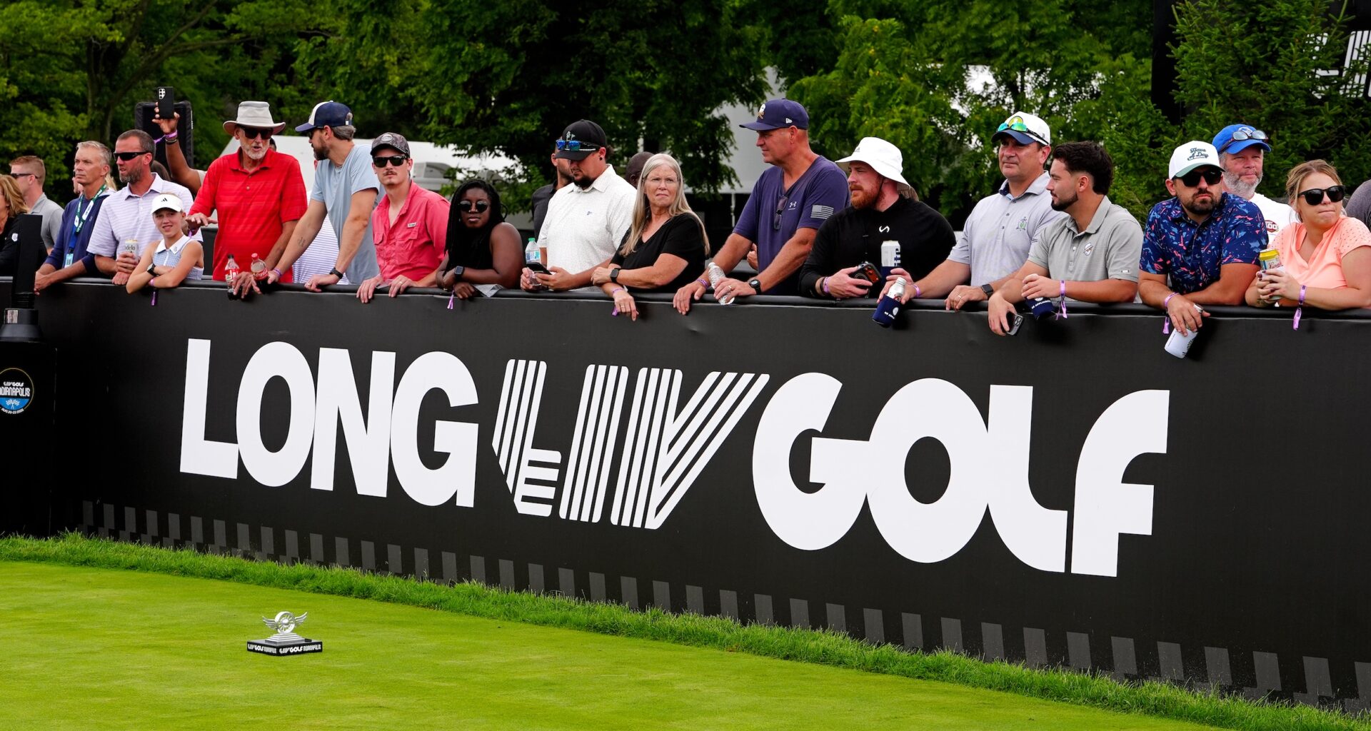 LIV Golf flags blow in the wind in New York.